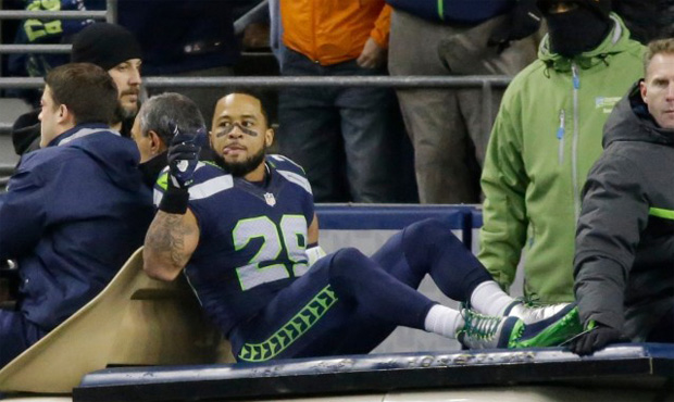 Earl Thomas said Tuesday that he is "caught in between" retiring and returning to the Seahawks. (AP...
