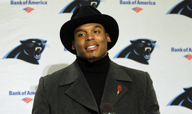 Cam Newton was benched for the start of Sunday night's game for not wearing a necktie on the team's...