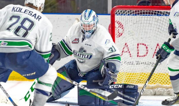 Rylan Toth makes one of his 41 saves during Seattle's 3-2 win over Spokane (Brian Liesse/T-Birds)...
