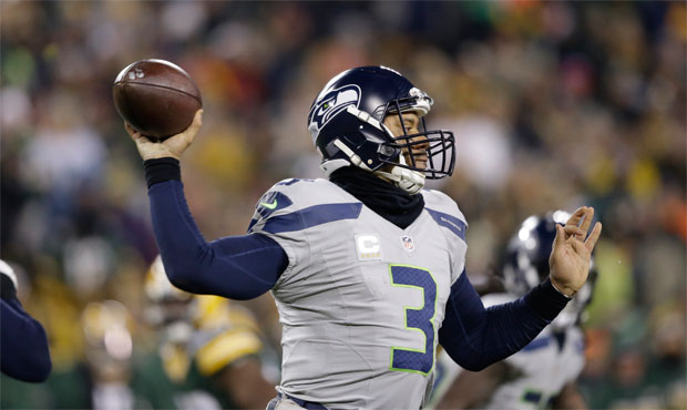 Russell Wilson threw a career-high five interceptions and missed on several other throws against Gr...