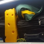It turns out a foam cheesehead fits nicely into the overhead bin. (Danny O'Neil, KIRO Radio)