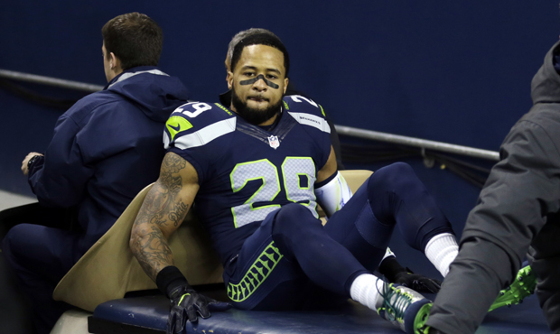 Earl Thomas was carted to the locker room after suffering a fractured leg in Sunday's game. (AP)...