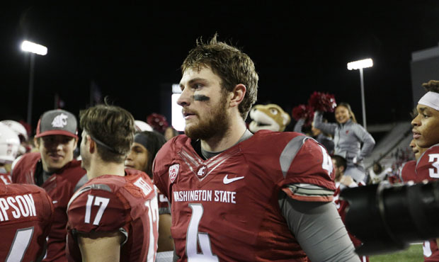 Luke Falk is a candidate to forego his senior season at WSU and enter the 2017 NFL Draft. (AP)...