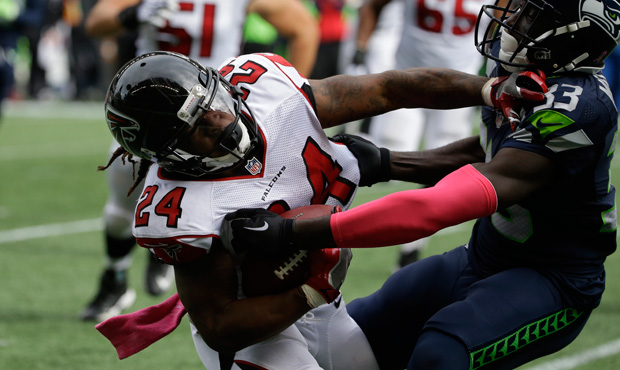 The Seahawks held the Falcons' top two running backs to 50 yards rushing combined on Oct. 16. (AP)...