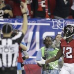 
              Atlanta Falcons wide receiver Mohamed Sanu (12) celebrates his touchdown against the Seattle Seahawks during the second half of an NFL football divisional football game, Saturday, Jan. 14, 2017, in Atlanta. (AP Photo/David Goldman)
            