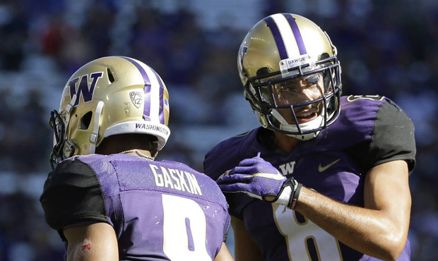 Myles Gaskin, Dante Pettis and the Huskies will open conference play in 2017 at Colorado. (AP)...