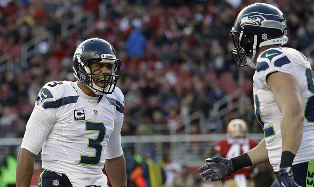 Russell Wilson and the Seahawks will host a playoff game next weekend as the NFC's No. 3 seed. (AP)...