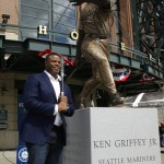 Seattle Mariners Hall of Famer Ken Griffey Jr. poses for a photo with a statue of him that was unveiled, Thursday, April 13, 2017, in front of Safeco Field in Seattle. (AP Photo/Ted S. Warren)