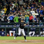 Fans rise to their feet to watch Miami Marlins' Ichiro Suzuki in the third inning during his first at-bat of a baseball game against his former team, the Seattle Mariners, Monday, April 17, 2017, in Seattle. Suzuki grounded out to first on the play. (AP Photo/Ted S. Warren)
