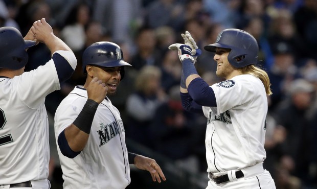 Mariners' Taylor Motter has hit two home runs in eight games this season. (AP Photo/Elaine Thompson...