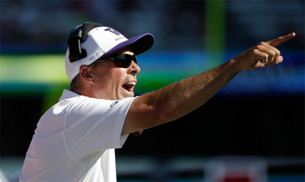 Chris Petersen's extension with UW reportedly makes him the Pac-12's top-paid coach at $4.9 million...