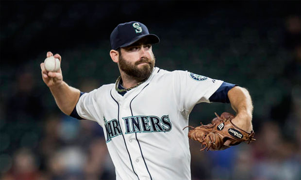Tony Zych called his simulated game at Safeco Field a "big step" in his recovery from a biceps issu...