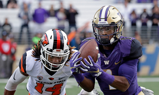 John Ross' All-American junior season at UW led to him being selected ninth in the NFL Draft....