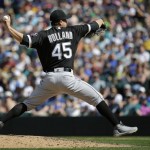 
              Chicago White Sox starting pitcher Derek Holland throws against the Seattle Mariners in the eighth inning of a baseball game, Sunday, May 21, 2017, in Seattle. (AP Photo/Ted S. Warren)
            