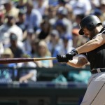 
              Chicago White Sox's Matt Davidson hits an RBI-single in the fifth inning of a baseball game against the Seattle Mariners to score Todd Frazier, Sunday, May 21, 2017, in Seattle. (AP Photo/Ted S. Warren)
            