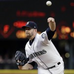 
              Seattle Mariners starting pitcher James Paxton throws against the Minnesota Twins in the third inning of a baseball game Tuesday, June 6, 2017, in Seattle. (AP Photo/Elaine Thompson)
            