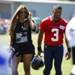 Seattle Seahawks quarterback Russell Wilson walks with his wife, pop singer Ciara, after NFL football training camp, Monday, July 31, 2017, in Renton, Wash. (AP Photo/Ted S. Warren)