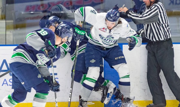 Donovan Nuels (left) battles for a puck with Turner Ottenbreit during Seattle's Blue-White game Sun...