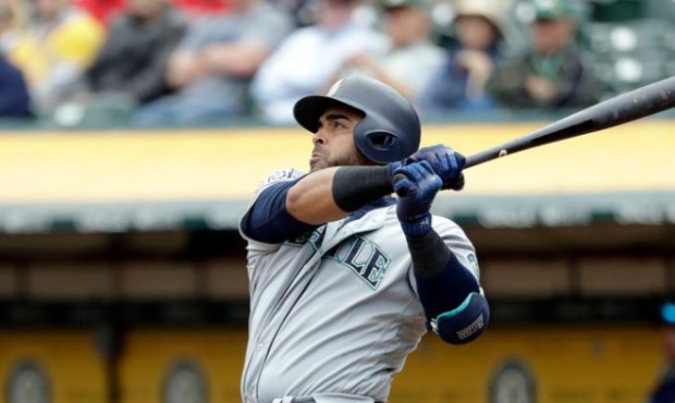 Nelson Cruz leads the AL in RBIs but might not start a game during Seattle's series in Atlanta. (AP...