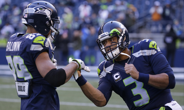 Russell Wilson has completed 70.7 percent of his pass attempts in three preseason games. (AP)...