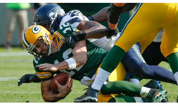 Cliff Avril sacked Aaron Rodgers Sunday but also was called for a TD-nullifying penalty. (AP)...
