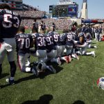 
              Several New England Patriots players kneel during the national anthem before an NFL football game against the Houston Texans, Sunday, Sept. 24, 2017, in Foxborough, Mass. (AP Photo/Michael Dwyer)
            