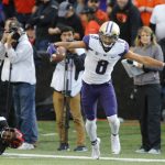 
              Washington wide receiver Dante Pettis (8) tip toes along the sideline after making a catch in the first half of an NCAA college football game against Oregon State, in Corvallis, Ore., Saturday, Sept. 30, 2017. (AP Photo/Timothy J. Gonzalez)
            