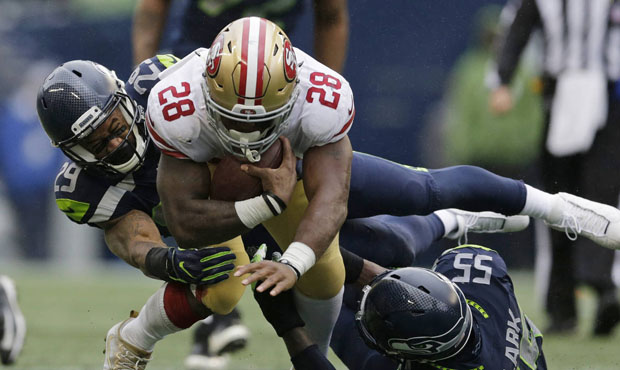 San Francisco running back Carlos Hyde gave the Seahawks some trouble on the ground. (AP)...