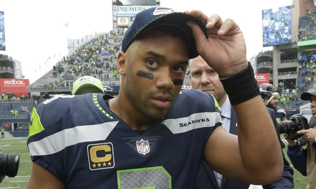 Russell Wilson rushed for 27 yards on Seattle's winning touchdown drive against the 49ers. (AP)...