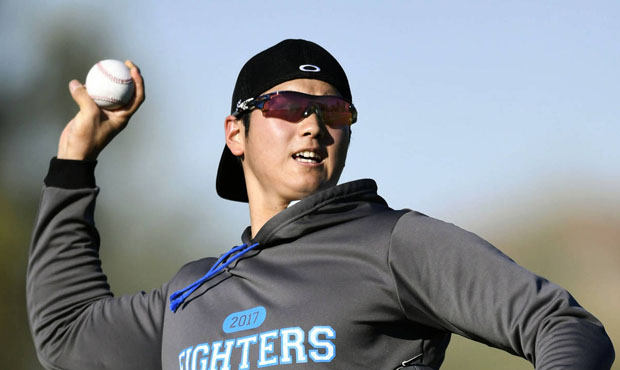 Shohei Otani is likely to give up hundreds of millions of dollars to comes to the MLB. (AP)...