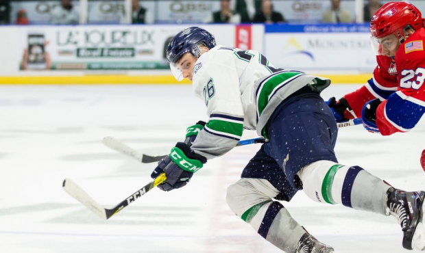 Seattle's Nolan Volcan is tripped and awarded a penalty shot during the T-Birds loss to Spokane Sun...