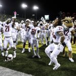 
              Washington State celebrates their 33-10 victory over Oregon in an NCAA college football game Saturday, Oct. 7, 2017 in Eugene, Ore. (AP Photo/Thomas Boyd)
            