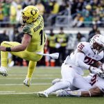
              Oregon quarterback Braxton Burmeister runs the ball in the first quarter to set up a field goal against Washington State in an NCAA college football game Saturday, Oct. 7, 2017 in Eugene, Ore. (AP Photo/Thomas Boyd)
            