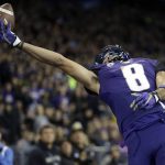 
              Washington's Dante Pettis just misses snagging a pass in the end zone against California in the first half of an NCAA college football game Saturday, Oct. 7, 2017, in Seattle. (AP Photo/Elaine Thompson)
            