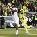 
              Washington State wide receiver Isaiah Johnson-Mack (9), pulls in a touchdown pass against Oregon cornerback Thomas Graham Jr., during the fourth quarter of an NCAA college football game Saturday, Oct. 7, 2017 in Eugene, Ore. (AP Photo/Thomas Boyd)
            