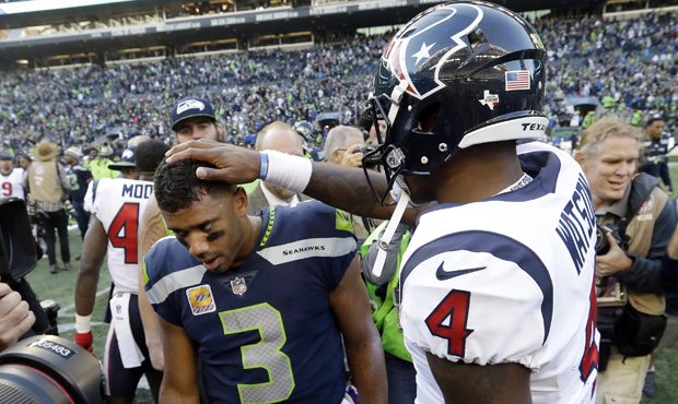 Russell Wilson and Deshaun Watson stole the show in an instant classic. (AP)...
