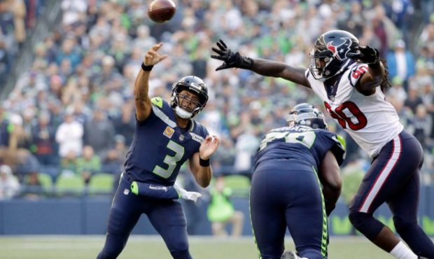 Russell Wilson had a career-best game throwing the ball to lead Seattle past Houston. (AP)...