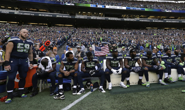 Eight Seahawks players sat during the national anthem before Sunday's game vs. the Colts. (AP)...