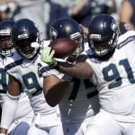 Sheldon Richardson had both an interception and fumble recovery in the Seahawks' win. (AP)