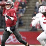 
              Washington State quarterback Luke Falk (4) throws a pass as he is chased by Stanford linebacker Peter Kalambayi (34) during the first half of an NCAA college football game in Pullman, Wash., Saturday, Nov. 4, 2017. (AP Photo/Young Kwak)
            
