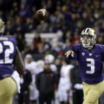 
              Washington quarterback Jake Browning (3) throws a pass to Lavon Coleman for a 6-yard touchdown against Utah during the first half of an NCAA college football game Saturday, Nov. 18, 2017, in Seattle. (AP Photo/Elaine Thompson)
            