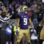 
              Washington running back Myles Gaskin (9) stands in the end zone after he scored his first touchdown in the first half of an NCAA college football game against Washington State, Saturday, Nov. 25, 2017, in Seattle. (AP Photo/Ted S. Warren)
            