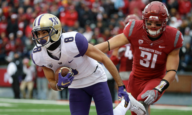 Danny O'Neil doesn't consider the Cougars as the Huskies' enemy, but rival just a rival. (AP)...