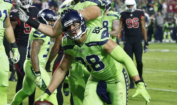 Seattle Seahawks tight end Jimmy Graham (88) celebrates his touchdown catch against the Arizona Car...