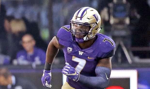 Keishawn Bierria recorded eight tackles and a fumble recovery in UW's win over Oregon. (AP)...