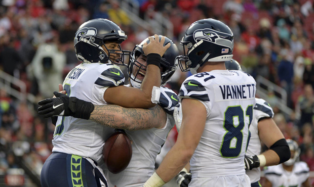 Russell Wilson threw two touchdowns and ran for another in Seattle's win over the 49ers. (AP)...