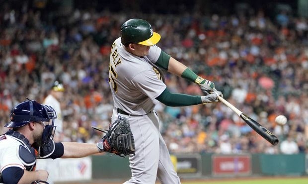 Ryon Healy is just 25, hit 25 home runs in 2017 and will make just over $500,000 next season. (AP)...