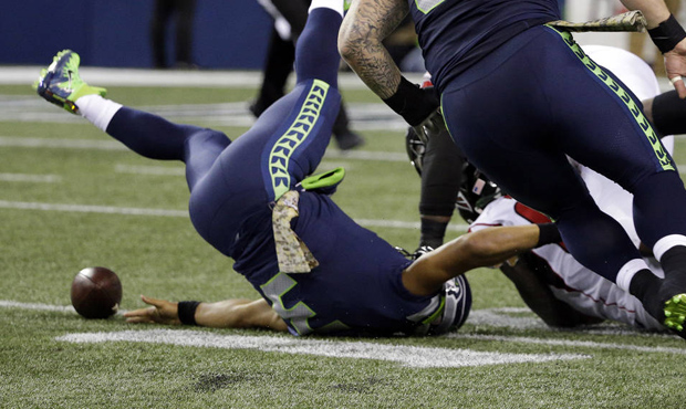 Russell Wilson's fumble was one of two takeaways Atlanta had in the first quarter. (AP)...