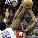 Washington State forward Robert Franks (3) shoots against Washington forward Noah Dickerson (15), Sunday, Jan. 28, 2018, in the first half of an NCAA college basketball game in Seattle. (AP Photo/Ted S. Warren)