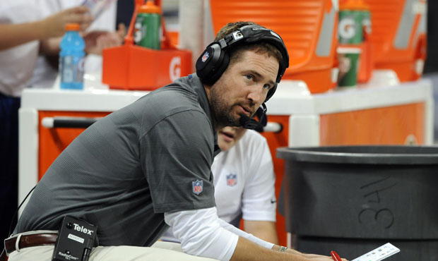 St. Louis Rams offensive coordinator Brian Schottenheimer sits on the bench during the fourth quart...